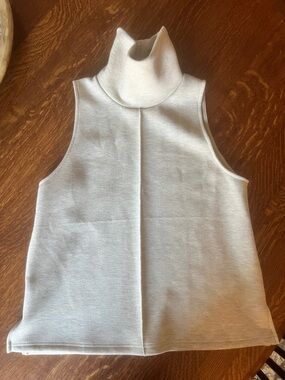 OGL Sleeveless Turtleneck Top in Light Cream